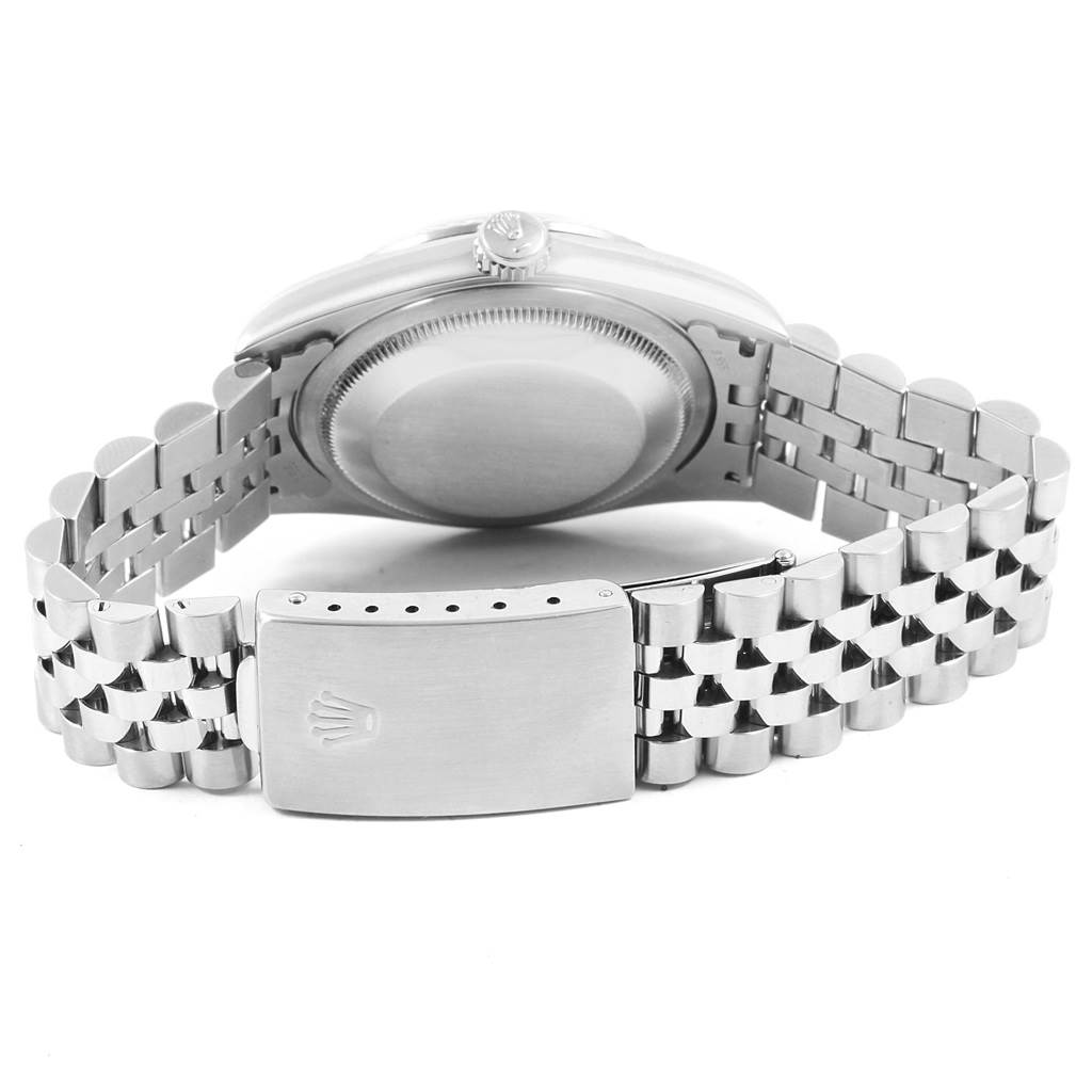 The image shows the back and bracelet clasp of a Rolex Datejust 20800 Men
s Stainless Steel Silver Dial 20800 Men
s Stainless Steel Silver Dial watch from a low rear angle.