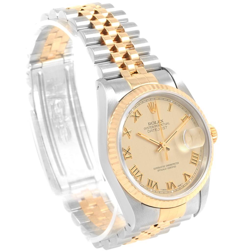 The Rolex Datejust 16233 Men
s Steel and Gold (two tone) Champagne Dial 16233 Men
s Steel and Gold (two tone) Champagne Dial watch is shown at an angled view highlighting the two-tone bracelet, bezel, dial, and crown.