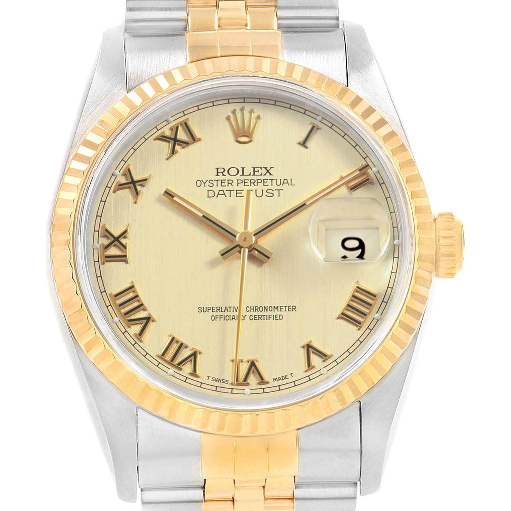 The image shows a close-up front view of a Rolex Datejust 16233 Men
s Steel and Gold (two tone) Champagne Dial 16233 Men
s Steel and Gold (two tone) Champagne Dial watch featuring a silver and gold design with a date display.
