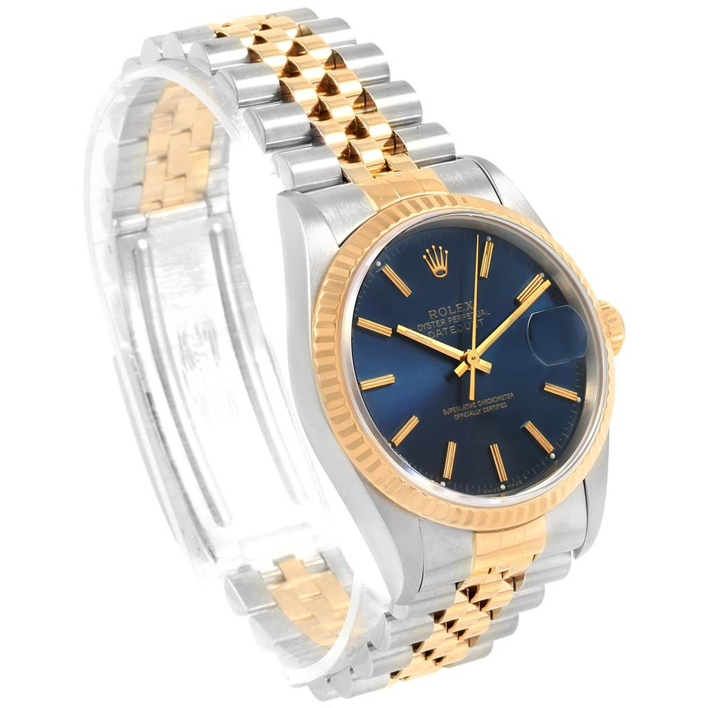 The image shows a Rolex Datejust 16233 Men's Steel and Gold (two tone) Blue Dial 16233 Men's Steel and Gold (two tone) Blue Dial watch at a three-quarter angle, highlighting the face, bezel, and two-tone bracelet.