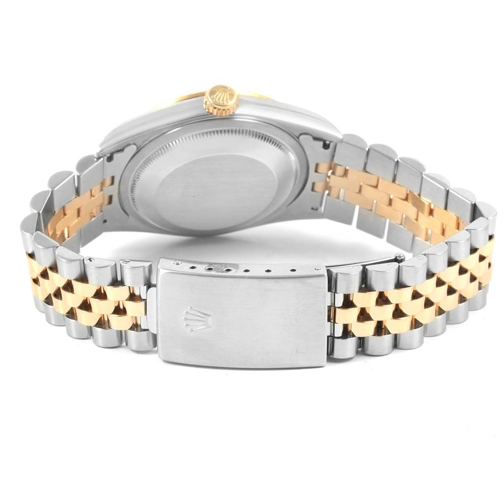 This image shows the back view of a Rolex Datejust 16233 Men's Steel and Gold (two tone) Beige Dial 16233 Men's Steel and Gold (two tone) Beige Dial, featuring the watch case and Jubilee bracelet with a two-tone clasp.