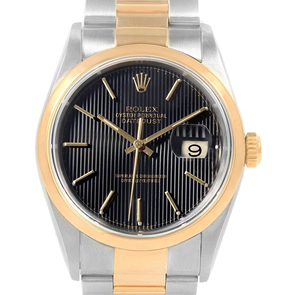 The image shows a Rolex Datejust 16203 Men's Steel and Gold (two tone) Black Dial 16203 Men's Steel and Gold (two tone) Black Dial watch from a frontal view, highlighting its face, bezel, crown, and bracelet.