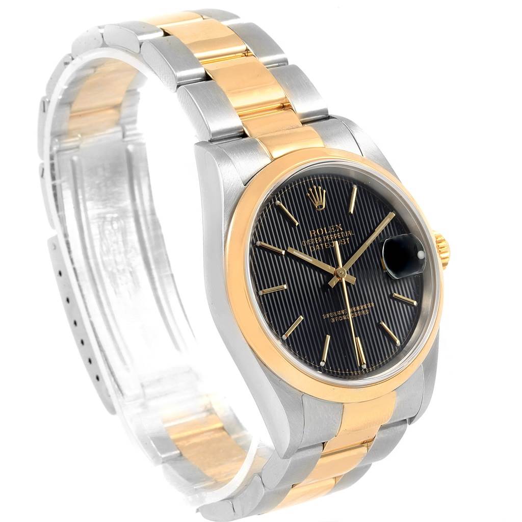 The image shows a Rolex Datejust 16203 Men's Steel and Gold (two tone) Black Dial 16203 Men's Steel and Gold (two tone) Black Dial watch at a slight left angle, highlighting its dial, bezel, and two-tone bracelet.