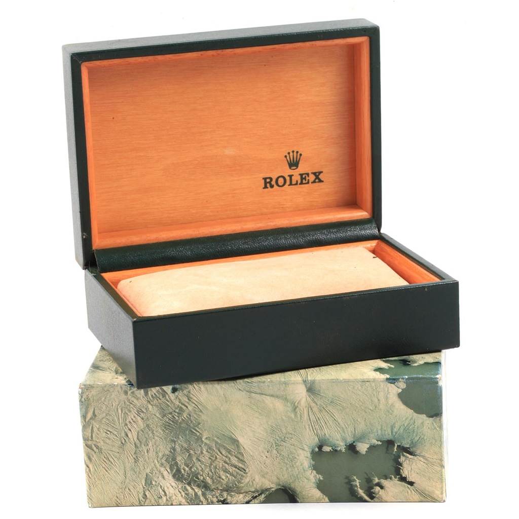 The image shows an empty Rolex Datejust 16233 Men's Steel and Gold (two tone) Blue Dial 16233 Men's Steel and Gold (two tone) Blue Dial watch box at an opened angle, revealing its interior and signature logo.