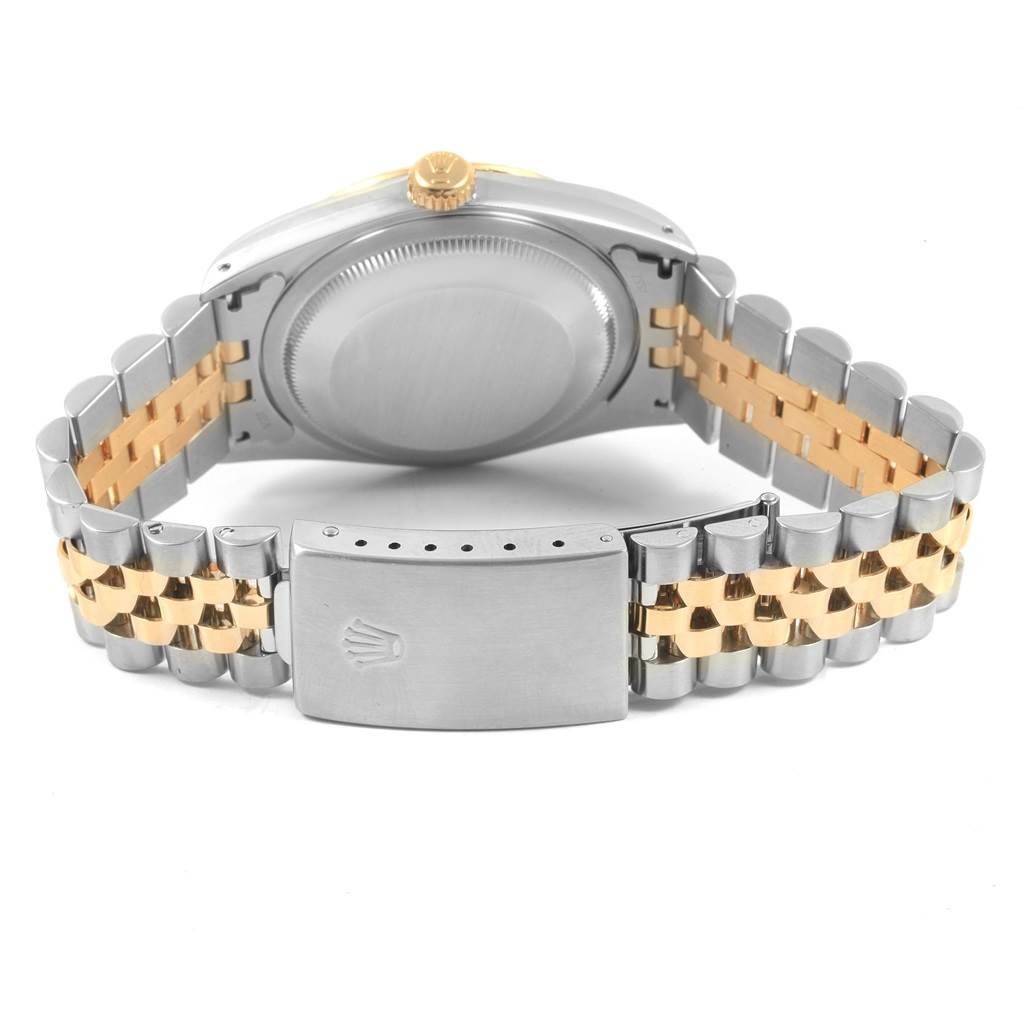 The image shows the rear view of a Rolex Datejust 16233 Men's Steel and Gold (two tone) Blue Dial 16233 Men's Steel and Gold (two tone) Blue Dial watch, highlighting the case back and two-tone bracelet with a clasp.