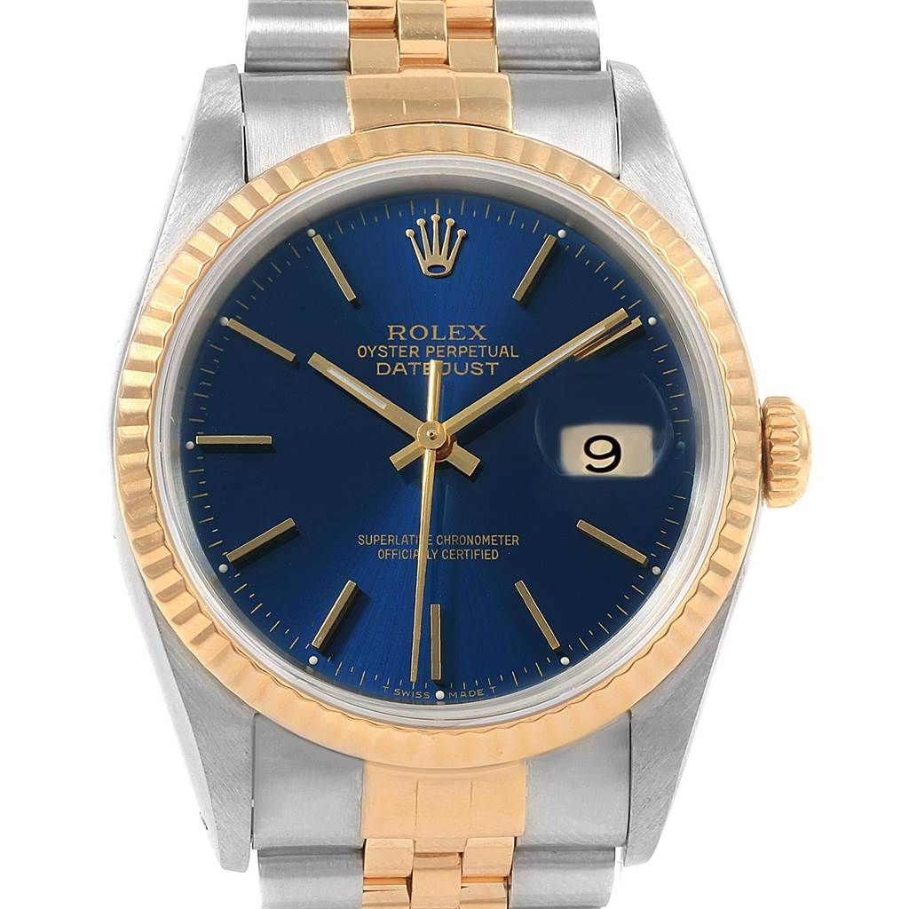 The image shows a Rolex Datejust 16233 Men's Steel and Gold (two tone) Blue Dial 16233 Men's Steel and Gold (two tone) Blue Dial watch, front view, highlighting the face, bezel, hands, date window, and part of the bracelet.