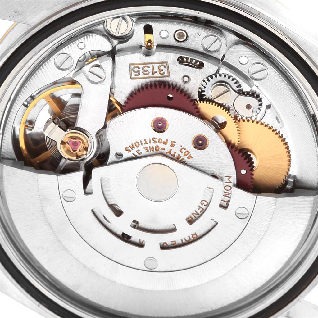 This image shows a close-up view of the movement mechanism inside a Rolex Datejust 16233 Men's Steel and Gold (two tone) Champagne Dial 16233 Men's Steel and Gold (two tone) Champagne Dial watch.