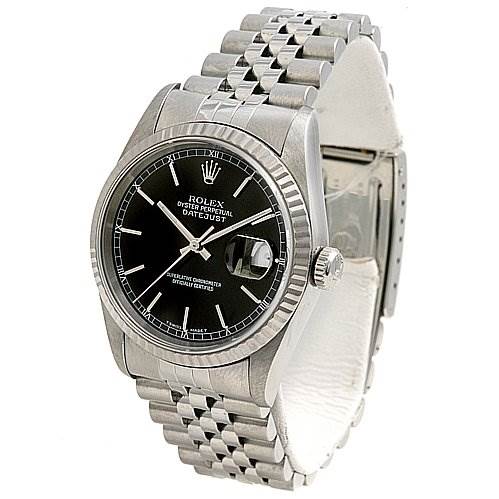 This image shows a Rolex Datejust 16234 Men's Stainless Steel Black Dial 16234 Men's Stainless Steel Black Dial watch at a slight angle, featuring its black dial, fluted bezel, date window, and metal bracelet.
