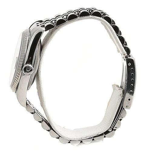 The image shows a side view of a Rolex Datejust 16234 Men's Stainless Steel Black Dial 16234 Men's Stainless Steel Black Dial watch, highlighting the case, crown, and Jubilee bracelet.