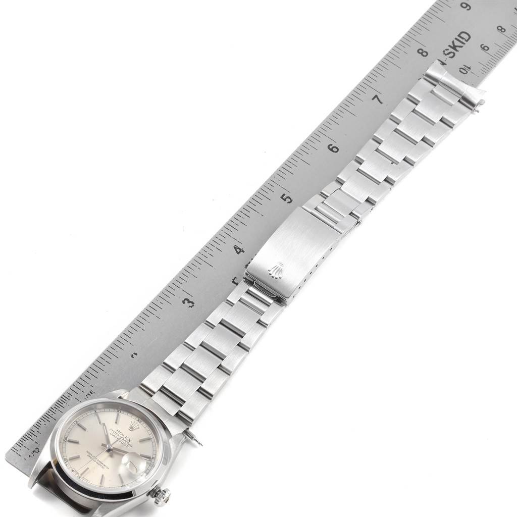 The image shows a Rolex Datejust 16200 Men's Stainless Steel Silver Dial 16200 Men's Stainless Steel Silver Dial watch laid flat next to a ruler, focusing on the bracelet and clasp.