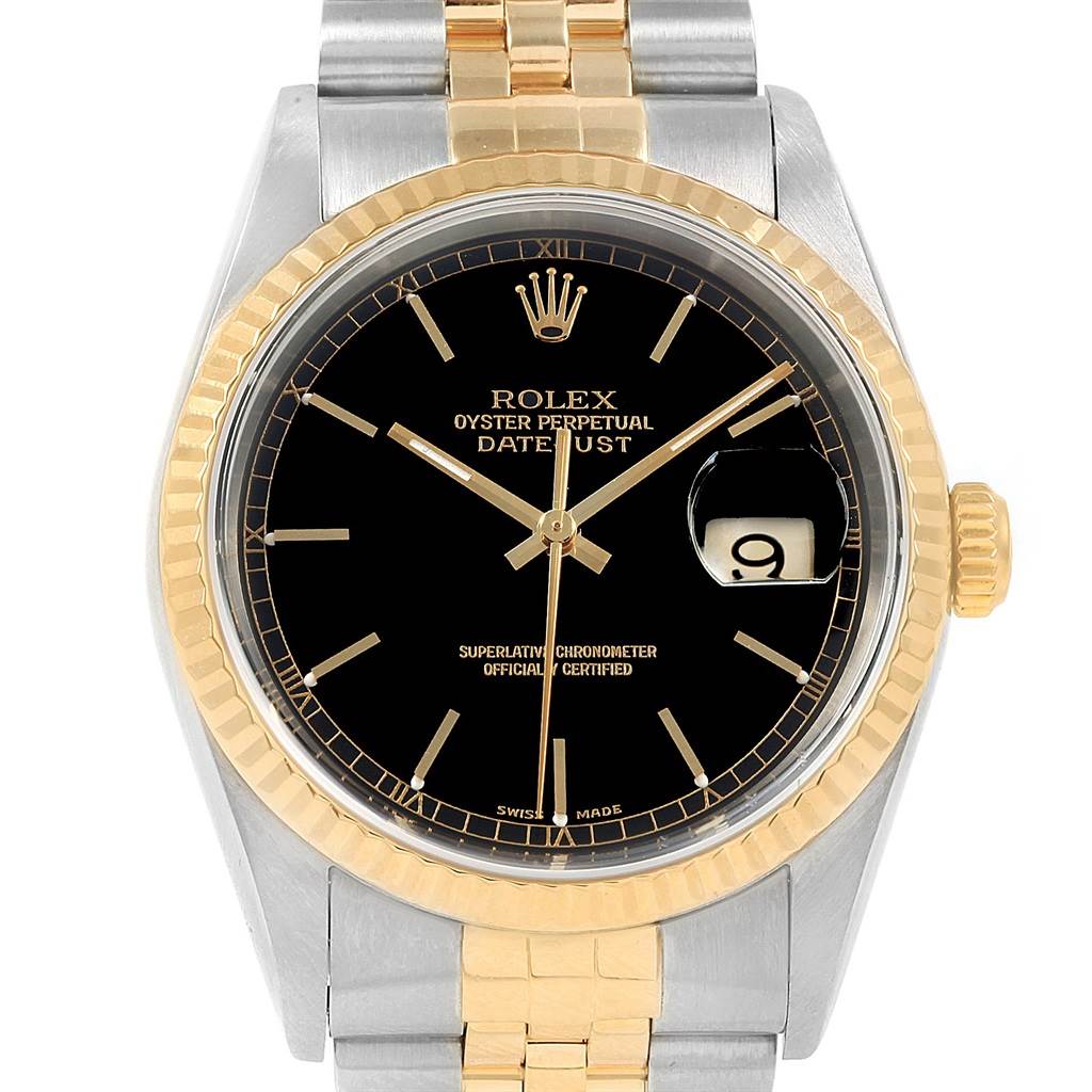 The image shows a Rolex Datejust 16233 Men's Steel and Gold (two tone) Black Dial 16233 Men's Steel and Gold (two tone) Black Dial watch from a front angle, highlighting its black dial, gold bezel, and two-tone bracelet.