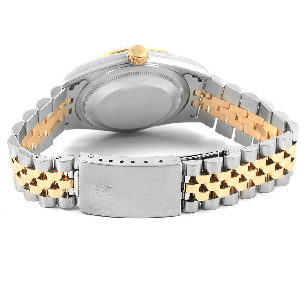 This image shows the back view of a Rolex Datejust 16233 Men's Steel and Gold (two tone) Black Dial 16233 Men's Steel and Gold (two tone) Black Dial watch, focusing on the case back, crown, and two-tone bracelet.