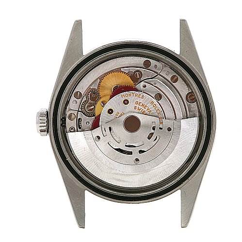 The image shows the back and internal mechanism of a Rolex Datejust 16220 Men's Stainless Steel White Dial 16220 Men's Stainless Steel White Dial watch.