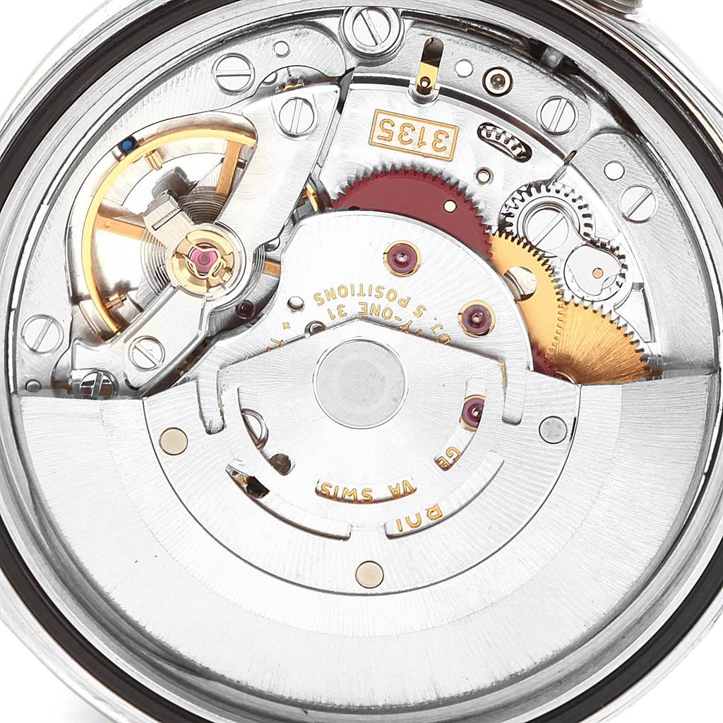 The image shows the internal movement and components of a Rolex Datejust 16220 Men's Stainless Steel White Dial 16220 Men's Stainless Steel White Dial watch from a close-up angle.