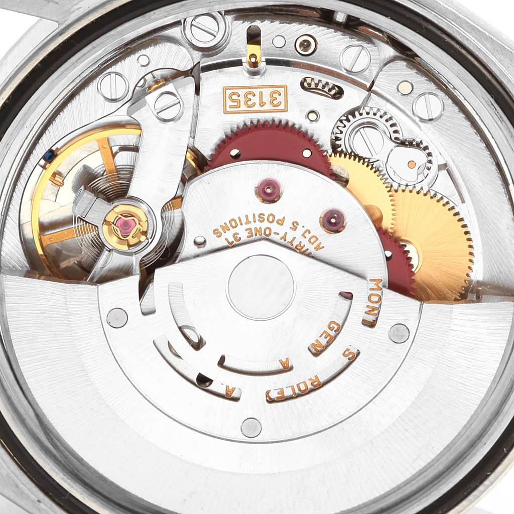 This is a close-up view of the internal mechanism and movement parts of a Rolex Datejust 16203 Men's Steel and Gold (two tone) Mother of Pearl Dial 16203 Men's Steel and Gold (two tone) Mother of Pearl Dial watch.