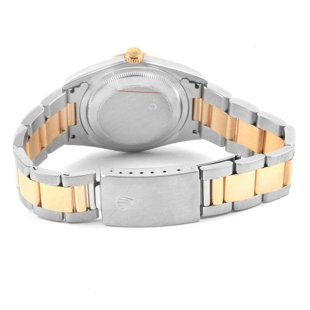 The image shows the back case and bracelet of a Rolex Datejust 16203 Men's Steel and Gold (two tone) Mother of Pearl Dial 16203 Men's Steel and Gold (two tone) Mother of Pearl Dial watch, highlighting the clasp and two-tone links.