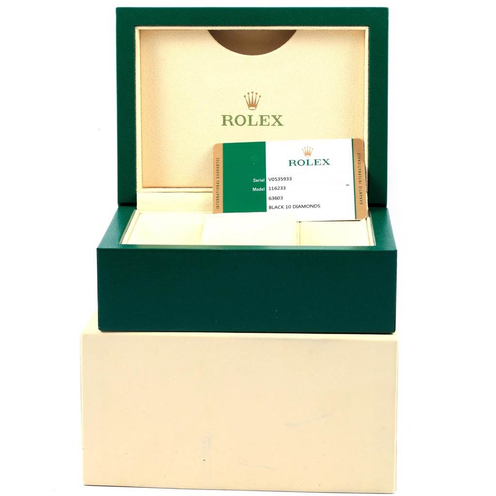 The image shows an open Rolex watch box with a certification card for the Datejust model.