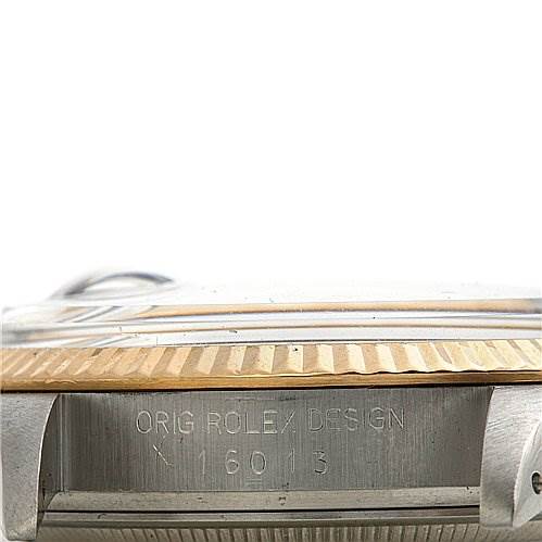 This image shows a close-up of the side of a Rolex Datejust 16013 Men's Stainless Steel White Dial 16013 Men's Stainless Steel White Dial watch, highlighting the model number "16013" and "ORIG ROLEX DESIGN" engraving.