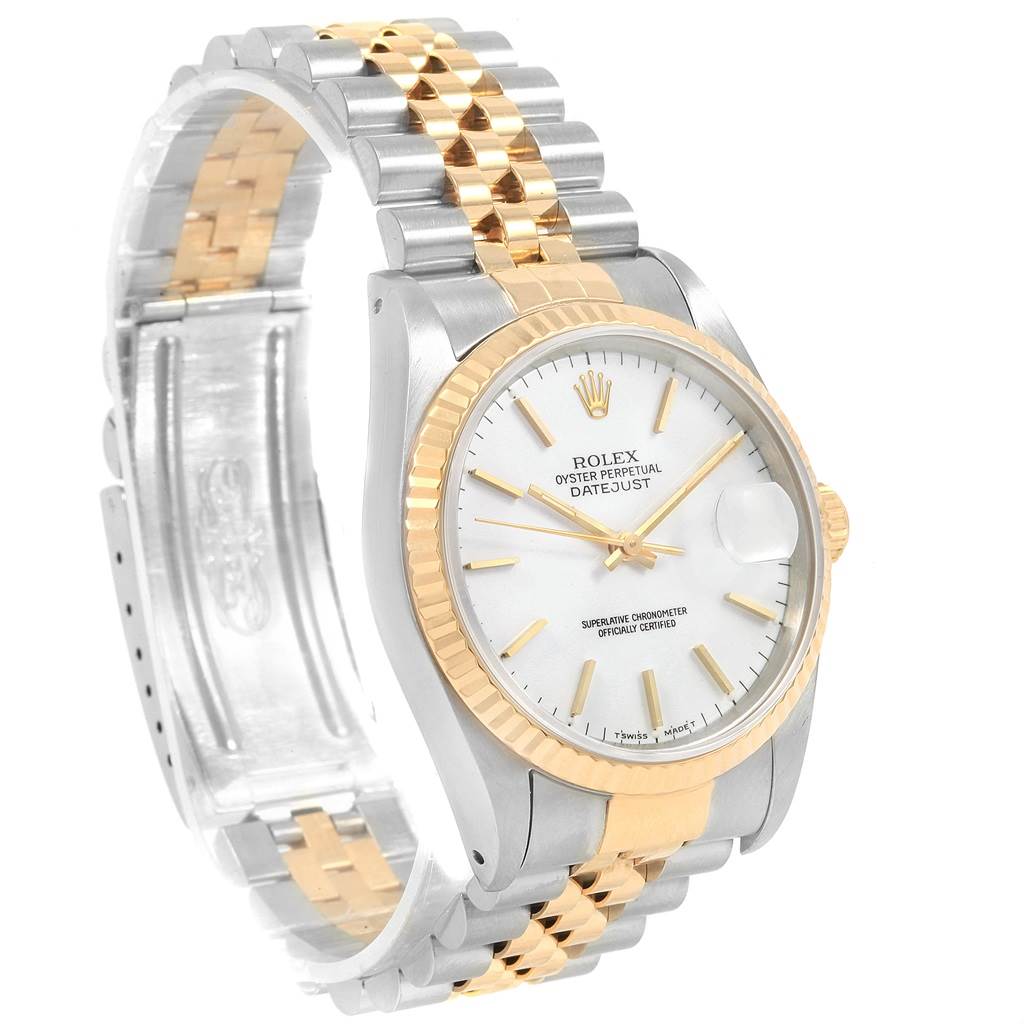 The Rolex Datejust 16233 Men's Steel and Gold (two tone) White Dial 16233 Men's Steel and Gold (two tone) White Dial watch is shown at a diagonal angle, highlighting its two-tone bracelet and fluted bezel.