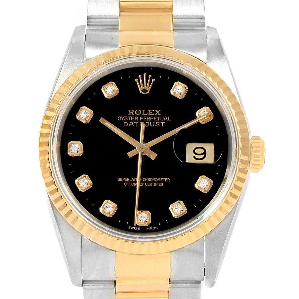 This Rolex Datejust 16233 Men
s Steel and Gold (two tone) Black Dial 16233 Men
s Steel and Gold (two tone) Black Dial watch is shown in a close-up angle, highlighting the dial, bezel, and part of the bracelet.