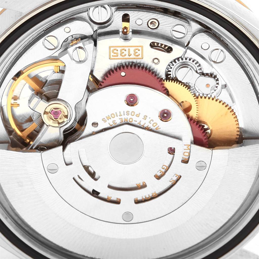 The image shows a close-up view of the movement mechanism inside a Rolex Datejust 16233 Men's Steel and Gold (two tone) Champagne Dial 16233 Men's Steel and Gold (two tone) Champagne Dial model watch.