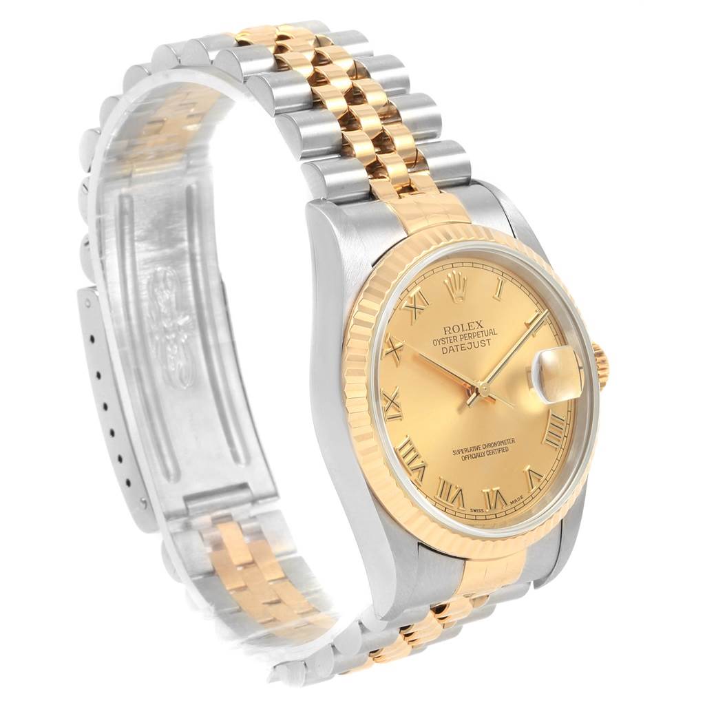The image shows a side angle of a Rolex Datejust 16233 Men's Steel and Gold (two tone) Champagne Dial 16233 Men's Steel and Gold (two tone) Champagne Dial watch, highlighting its dial, bezel, and two-tone bracelet.