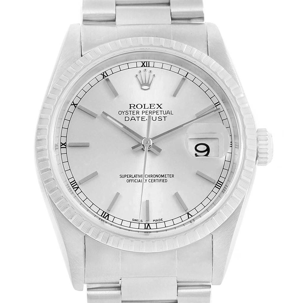 This image shows a frontal view of a Rolex Datejust 16220 Men's Stainless Steel Silver Dial 16220 Men's Stainless Steel Silver Dial watch highlighting the dial, bezel, crown, and part of the bracelet.