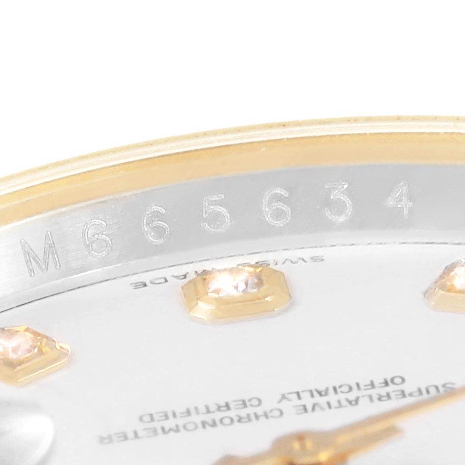 The image shows a close-up angle of the serial number and part of the dial with diamond markers on a Rolex Datejust 116233 Men's Steel and Gold (two tone) White Dial 116233 Men's Steel and Gold (two tone) White Dial watch.