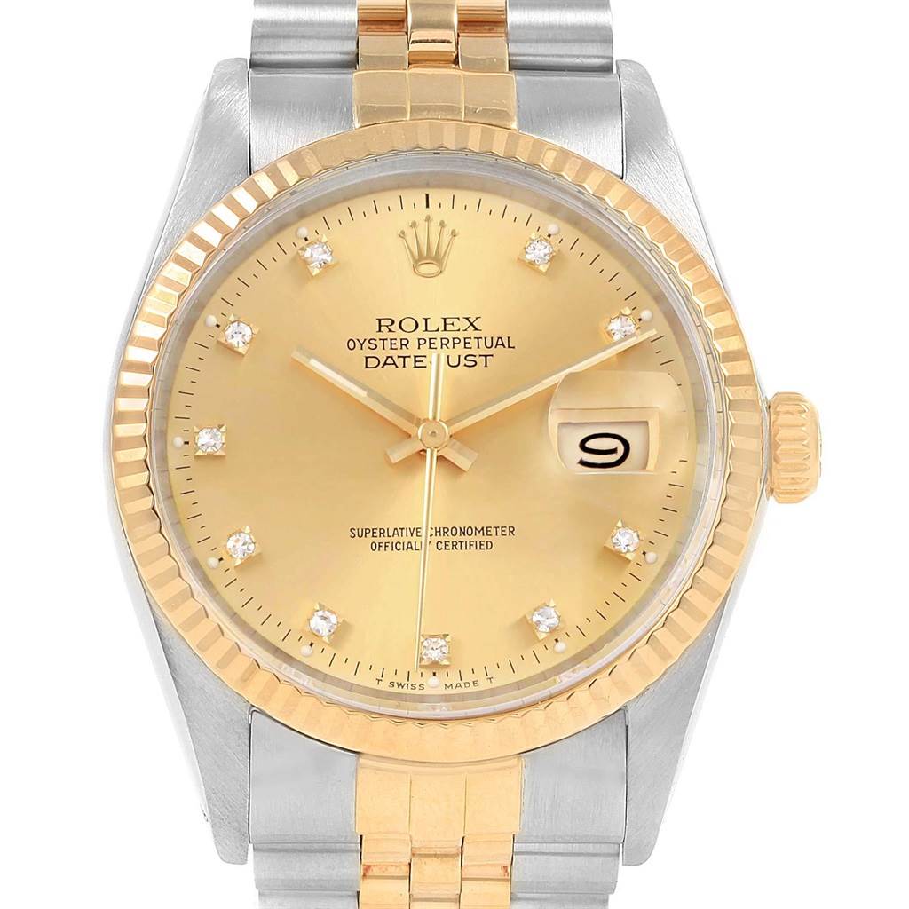 This image shows a frontal view of the Rolex Datejust 16013 Men's Stainless Steel Champagne Dial 16013 Men's Stainless Steel Champagne Dial watch, highlighting its dial, bezel, and bracelet.