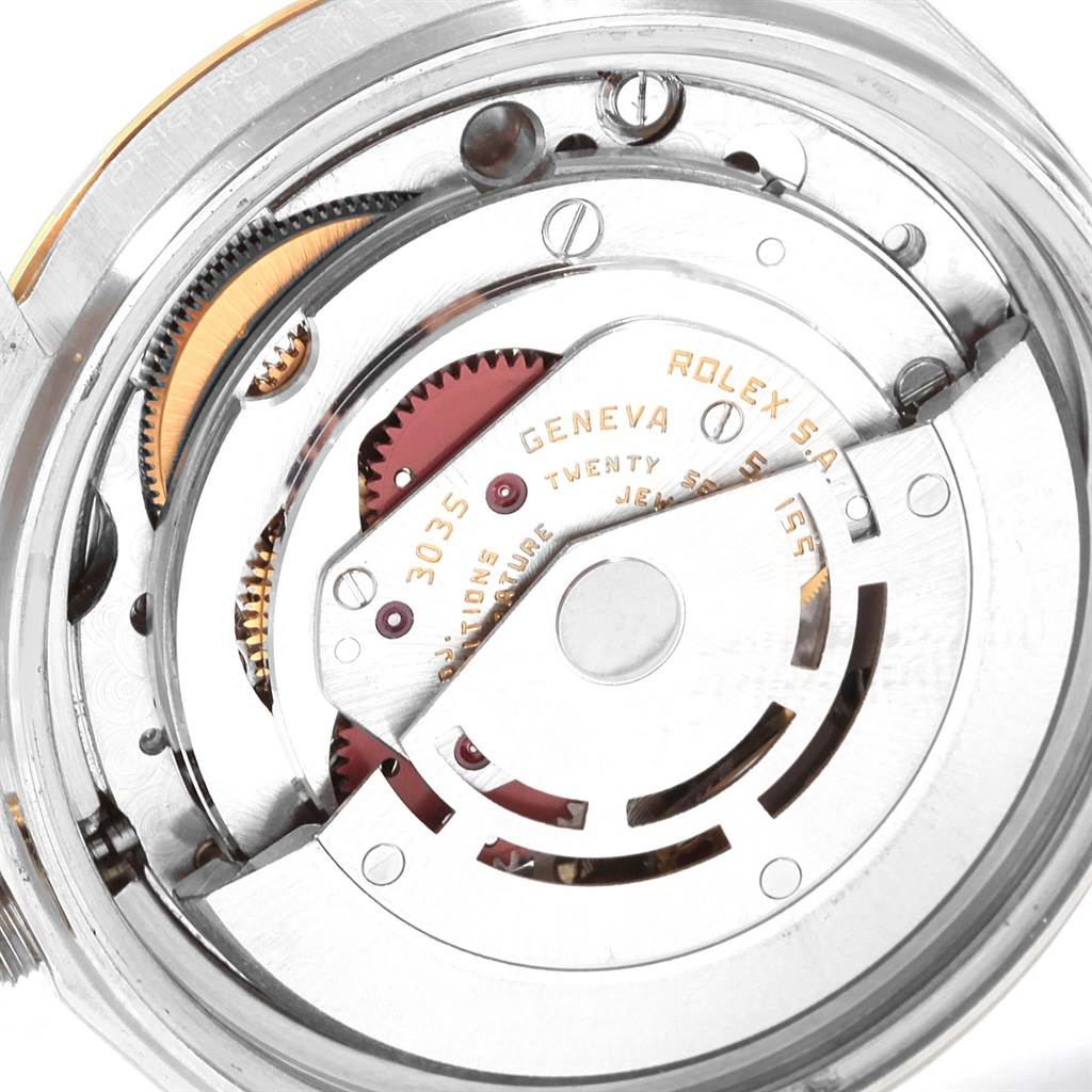 This image shows the internal movement components of a Rolex Datejust 16013 Men's Stainless Steel Champagne Dial 16013 Men's Stainless Steel Champagne Dial watch from a close-up angle.