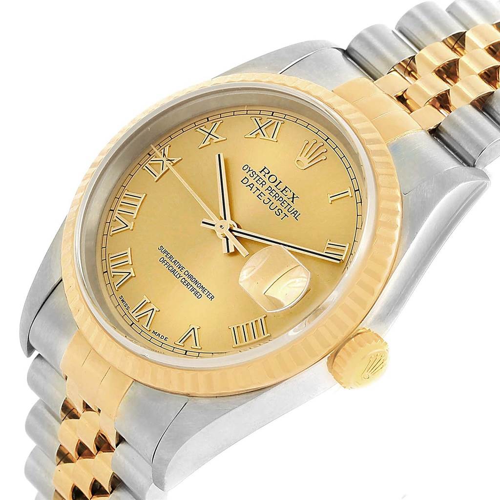 This image shows a close-up angle of a Rolex Datejust 16233 Men's Steel and Gold (two tone) Champagne Dial 16233 Men's Steel and Gold (two tone) Champagne Dial watch, highlighting its gold dial, Roman numeral markers, and two-tone Jubilee bracelet.