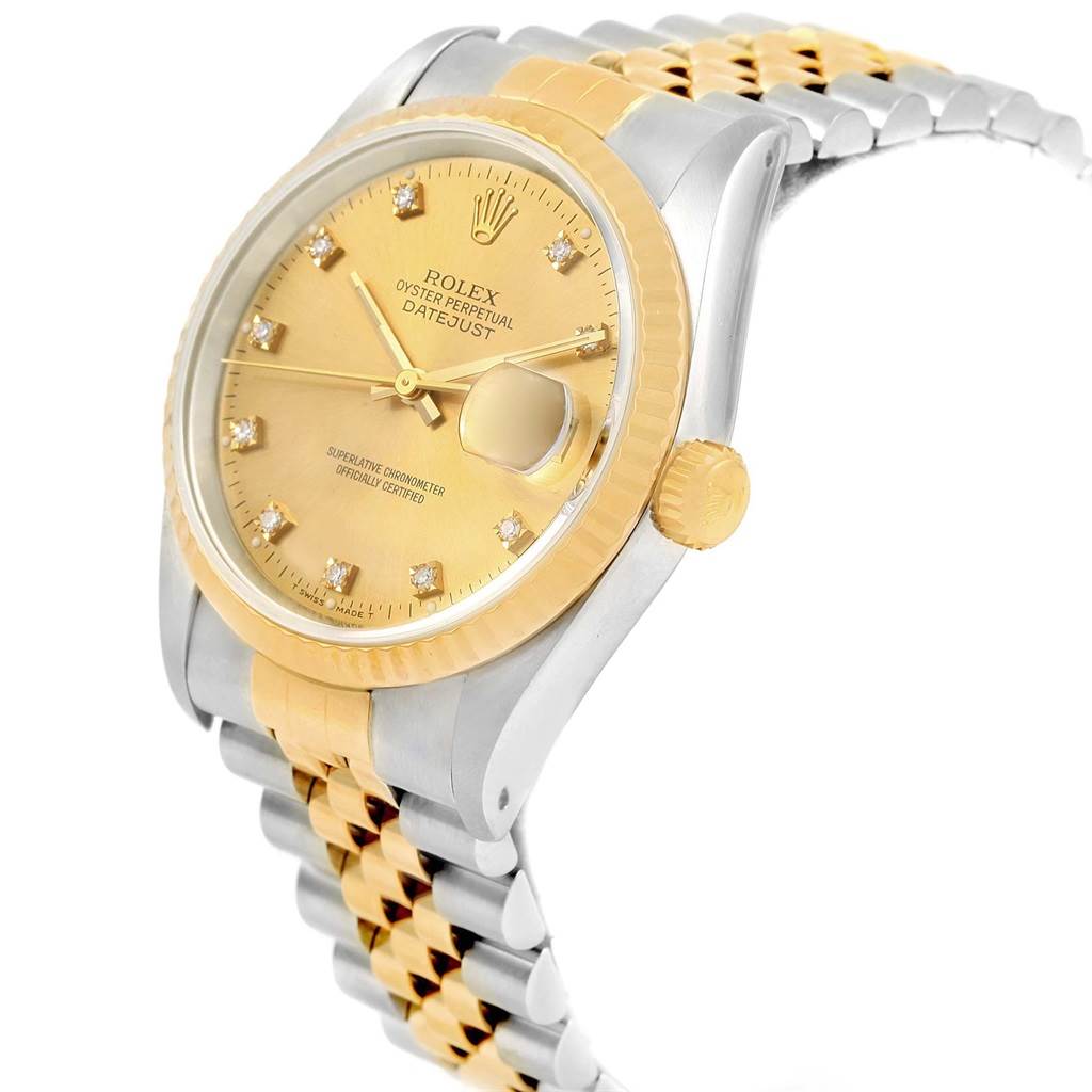 This image shows a side angle of the Rolex Datejust 16233 Men
s Steel and Gold (two tone) Champagne Dial 16233 Men
s Steel and Gold (two tone) Champagne Dial watch, highlighting the dial, bezel, crown, and part of the bracelet.