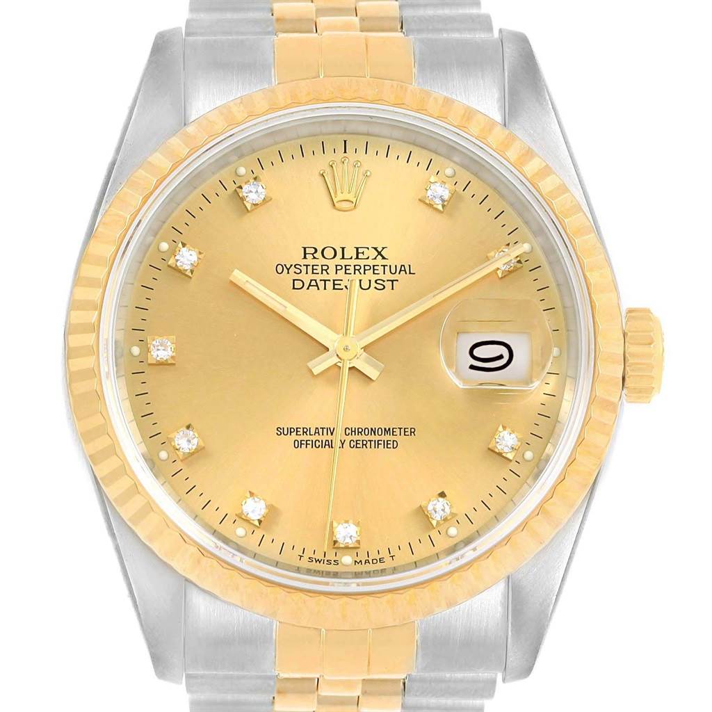 The image shows a front view of a Rolex Datejust 16233 Men
s Steel and Gold (two tone) Champagne Dial 16233 Men
s Steel and Gold (two tone) Champagne Dial watch, highlighting its gold dial, date window, and two-tone bracelet.