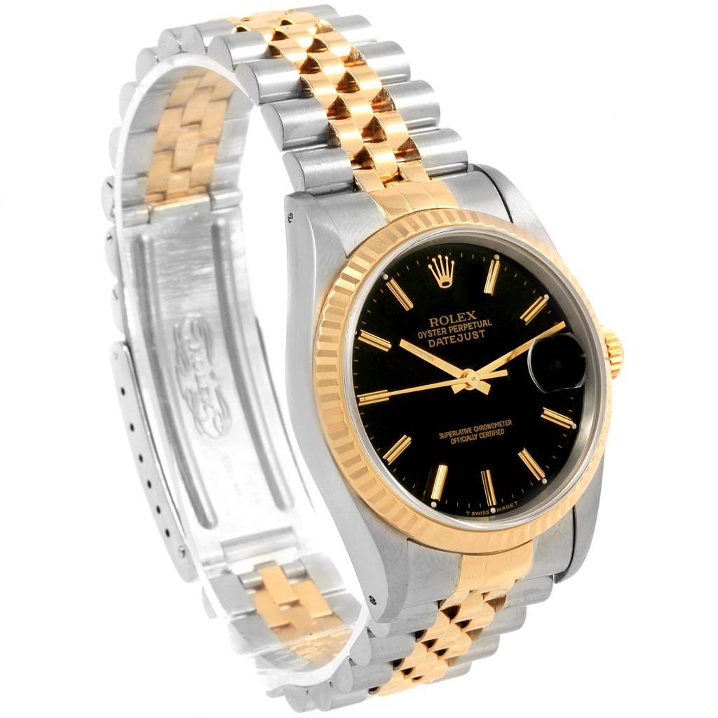 This image shows a Rolex Datejust 16233 Men's Steel and Gold (two tone) Black Dial 16233 Men's Steel and Gold (two tone) Black Dial watch at an angle displaying the face, bezel, and Jubilee bracelet.