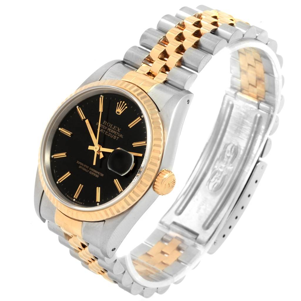 This Rolex Datejust 16233 Men's Steel and Gold (two tone) Black Dial 16233 Men's Steel and Gold (two tone) Black Dial watch is shown at an angle displaying its face, bezel, crown, and two-tone bracelet.