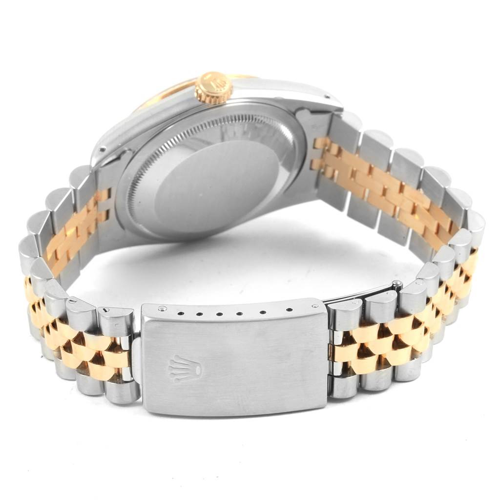 The image shows a rear and side view of the Rolex Datejust 16233 Men's Steel and Gold (two tone) Black Dial 16233 Men's Steel and Gold (two tone) Black Dial watch, highlighting the case back and two-tone bracelet with the clasp.