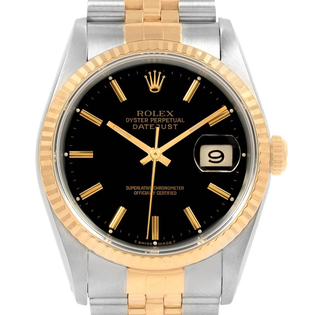 Front view of Rolex Datejust 16233 Men's Steel and Gold (two tone) Black Dial 16233 Men's Steel and Gold (two tone) Black Dial watch showing the black dial, gold fluted bezel, and two-tone metal bracelet.