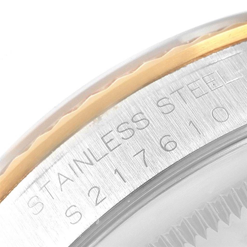 This close-up image shows the stainless steel case and the edge of the bezel of a Rolex Datejust 16233 Men's Steel and Gold (two tone) Black Dial 16233 Men's Steel and Gold (two tone) Black Dial watch.