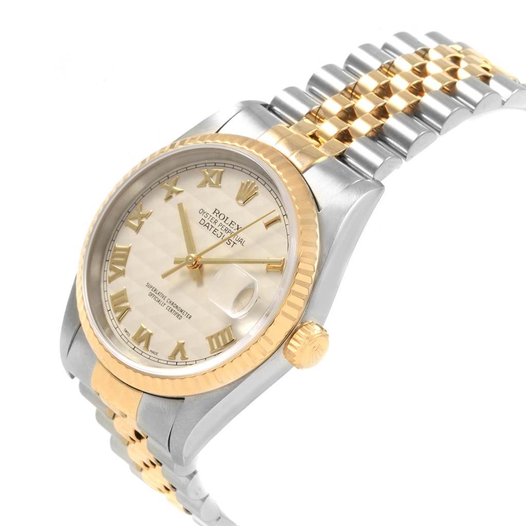 The image shows a front-side angle of a Rolex Datejust 16233 Men
s Steel and Gold (two tone) Beige Dial 16233 Men
s Steel and Gold (two tone) Beige Dial watch displaying its face, bezel, bracelet, and crown.