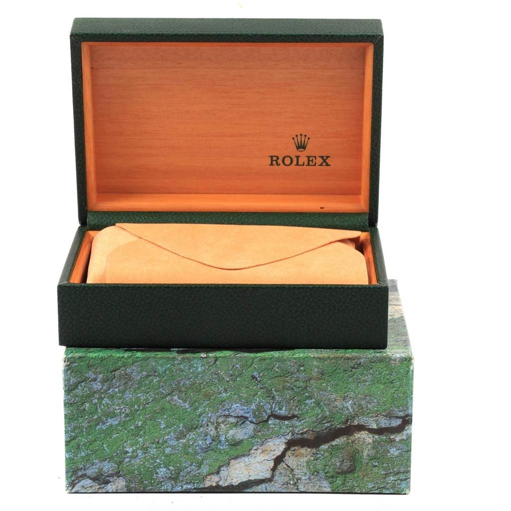 Shown is an open Rolex Datejust 16233 Men
s Steel and Gold (two tone) Beige Dial 16233 Men
s Steel and Gold (two tone) Beige Dial watch box, displaying the inner lining and cushion, viewed from the front.