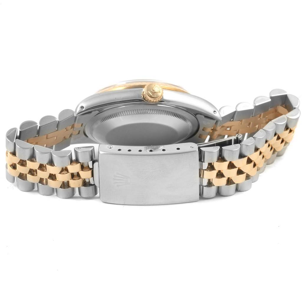 This image shows the back of a Rolex Datejust 16233 Men
s Steel and Gold (two tone) Beige Dial 16233 Men
s Steel and Gold (two tone) Beige Dial model watch, highlighting the clasp and two-tone bracelet.