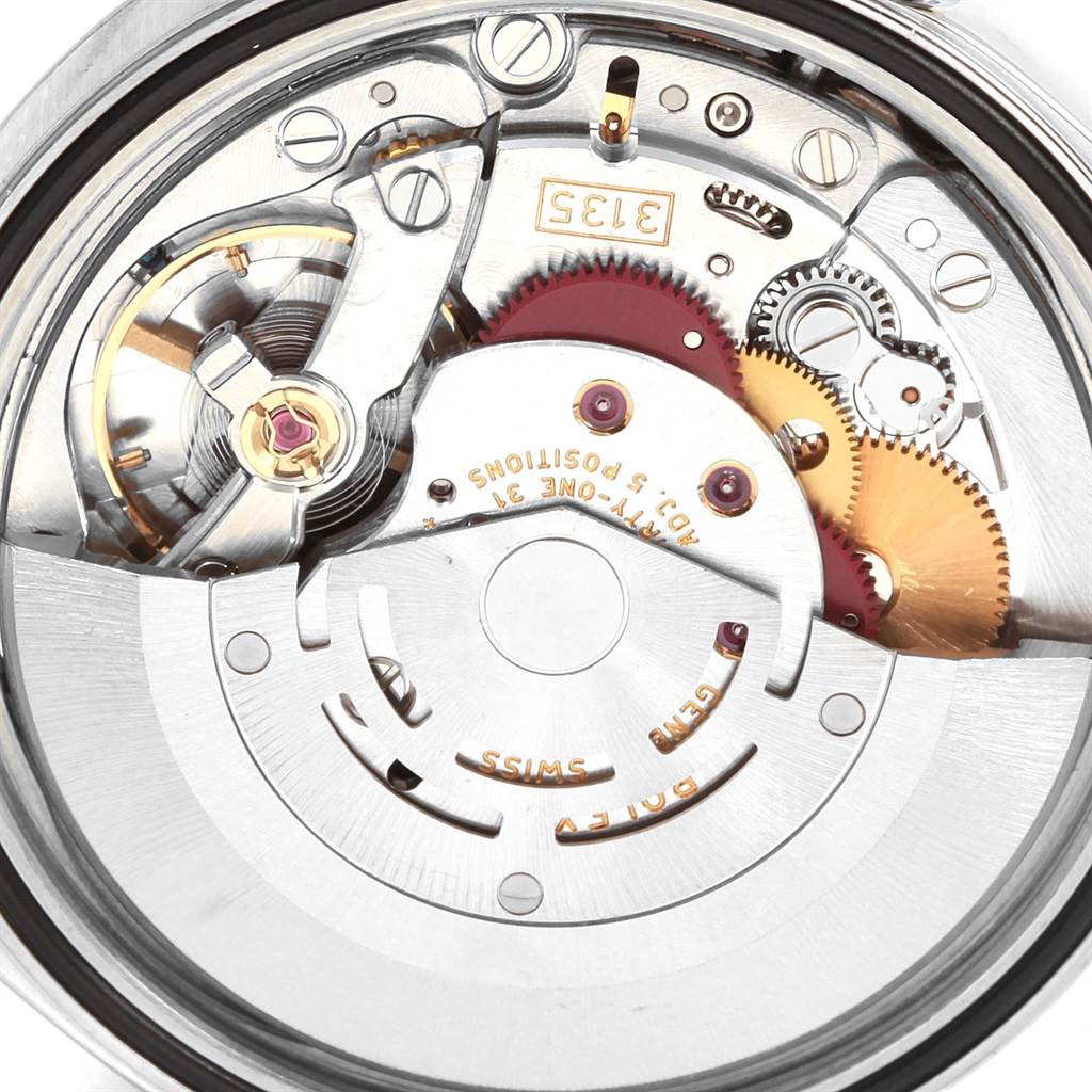 This image shows the internal movement mechanism of a Rolex Datejust 16233 Men
s Steel and Gold (two tone) Beige Dial 16233 Men
s Steel and Gold (two tone) Beige Dial watch, viewed from the back.