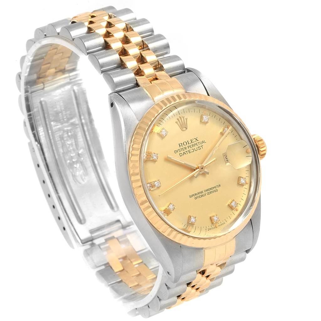 The Rolex Datejust 16013 Men's Stainless Steel Champagne Dial 16013 Men's Stainless Steel Champagne Dial watch is shown at a slight angle displaying the face, bezel, crown, and bracelet.