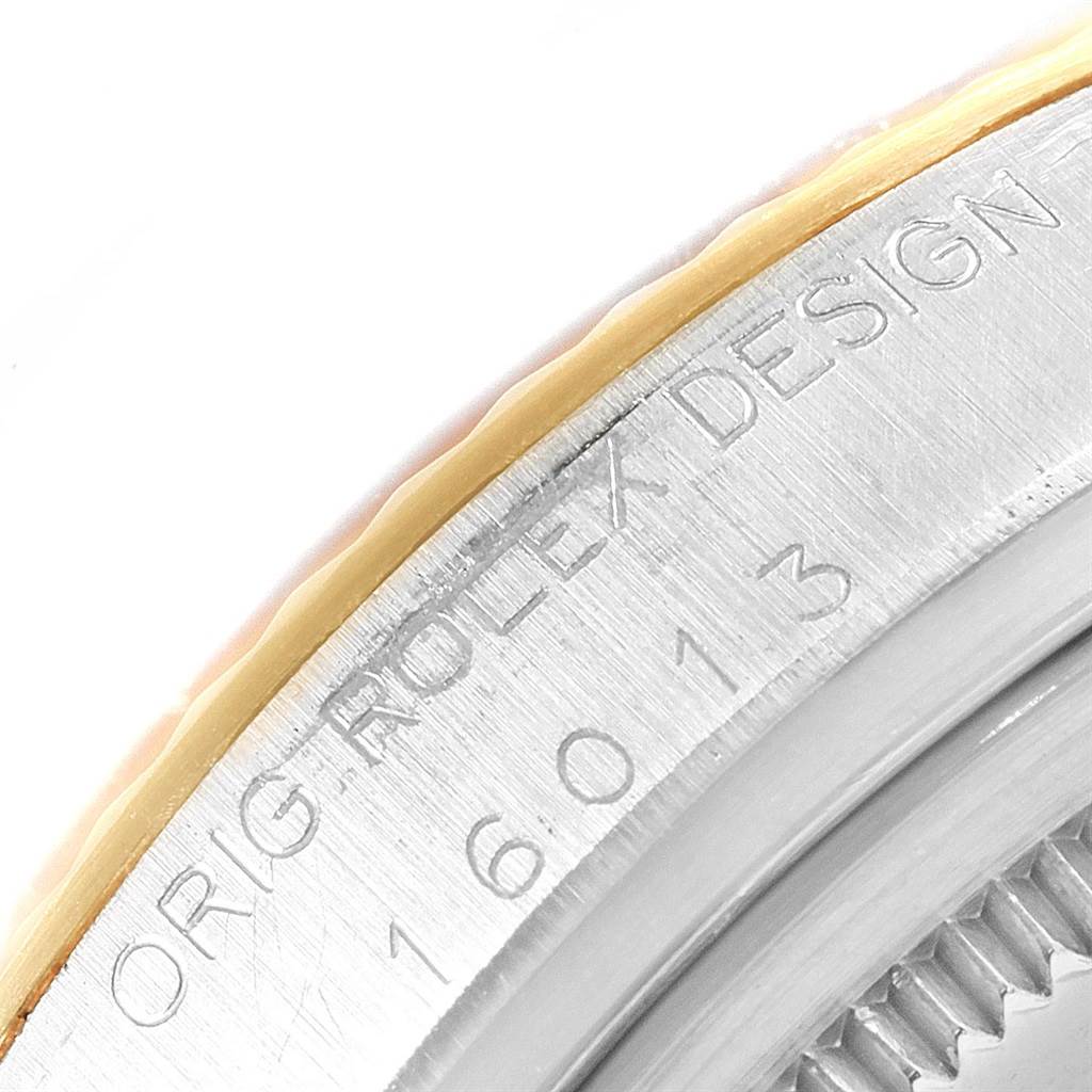 The image shows a close-up of the engravings and edge detail on the case back of a Rolex Datejust 16013 Men's Stainless Steel Champagne Dial 16013 Men's Stainless Steel Champagne Dial model watch.