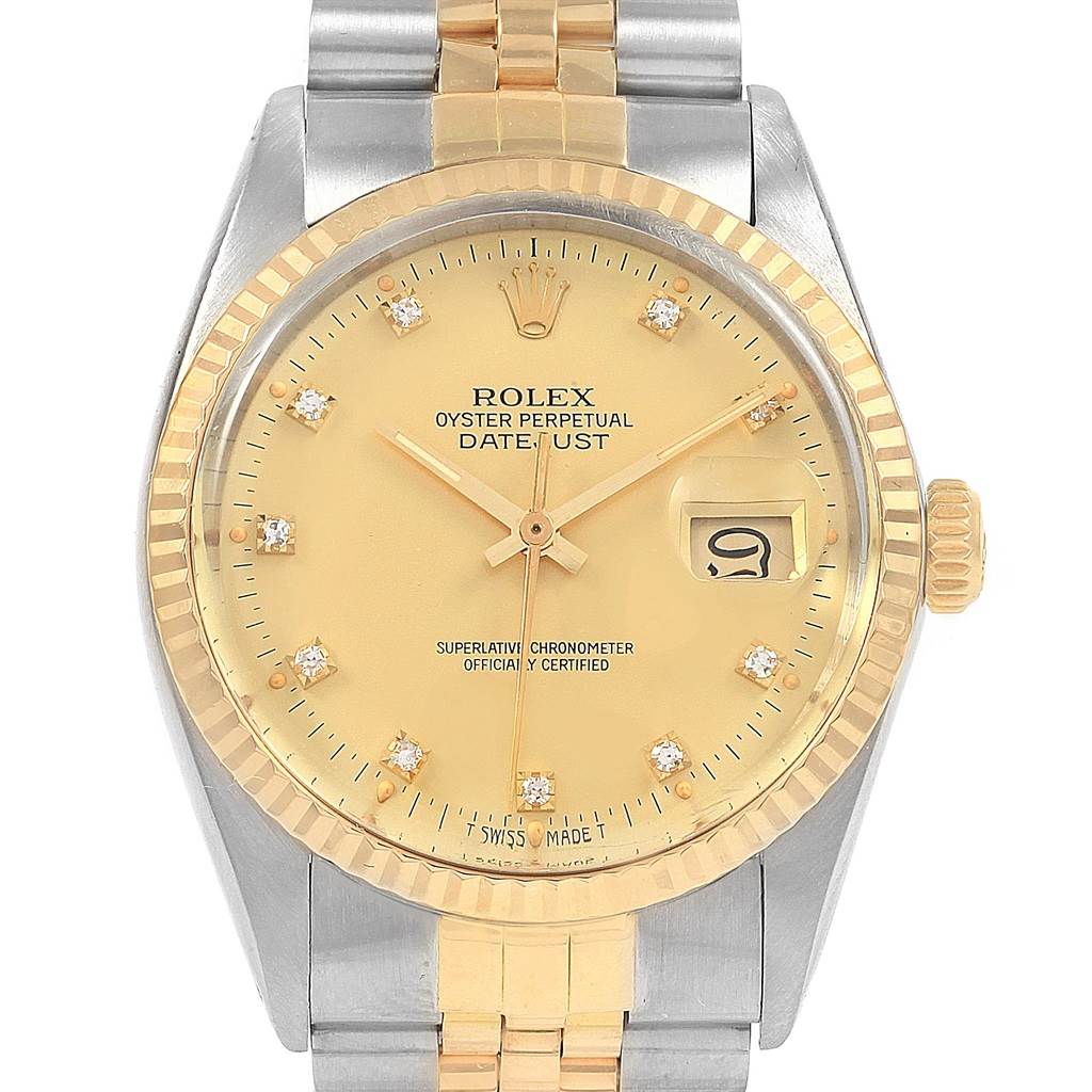 This image shows a front view of the Rolex Datejust 16013 Men's Stainless Steel Champagne Dial 16013 Men's Stainless Steel Champagne Dial watch, highlighting its dial, bezel, bracelet, hands, and date window.