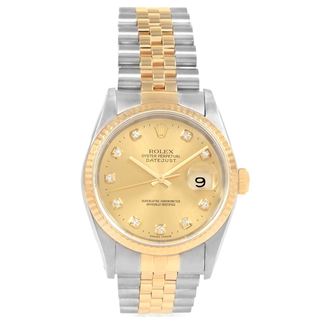 The Rolex Datejust 16233 Men
s Steel and Gold (two tone) Champagne Dial 16233 Men
s Steel and Gold (two tone) Champagne Dial watch is shown from a front angle, displaying its face, dial, hands, fluted bezel, and two-tone bracelet.