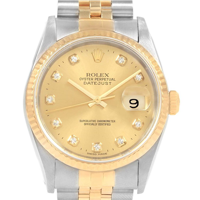 The image shows a frontal view of the Rolex Datejust, highlighting its gold dial, fluted bezel, and two-tone bracelet.