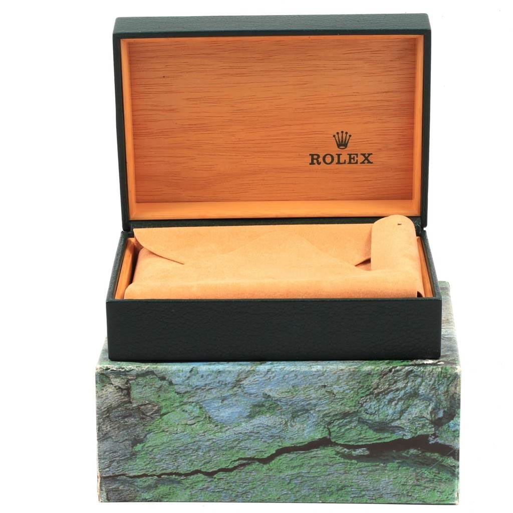 This image shows an open Rolex Datejust 16233 Men
s Steel and Gold (two tone) Champagne Dial 16233 Men
s Steel and Gold (two tone) Champagne Dial watch box with a cushion inside.