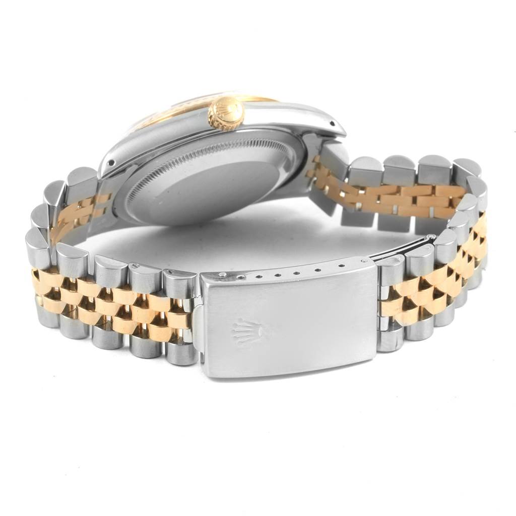 The image shows the case back, crown, and clasp of a Rolex Datejust 16233 Men's Steel and Gold (two tone) Black Dial 16233 Men's Steel and Gold (two tone) Black Dial watch, featuring a two-tone metal bracelet.