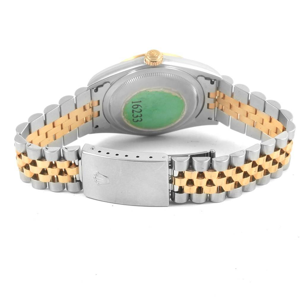 This image shows the back of a Rolex Datejust 16233 Men
s Steel and Gold (two tone) Blue Dial 16233 Men
s Steel and Gold (two tone) Blue Dial watch, highlighting the case, two-tone bracelet, and clasp.